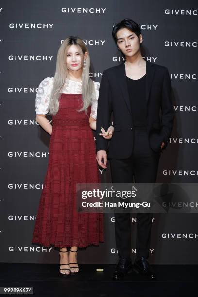 Qri of South Korean girl group T-ara and Yoon Yong-Bin attend during a promotional event for the Givenchy on July 5, 2018 in Seoul, South Korea.