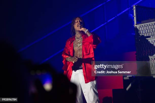 Wiz Khalifa performs on stage after the HUGO show during the Berlin Fashion Week Spring/Summer 2019 at Motorwerk on July 5, 2018 in Berlin, Germany.