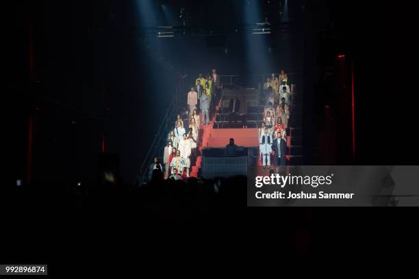 Wiz Khalifa performs on stage after the HUGO show during the Berlin Fashion Week Spring/Summer 2019 at Motorwerk on July 5, 2018 in Berlin, Germany.