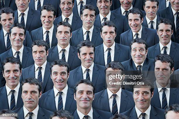 crowd of businessmen with multiple expressions - cloning stock-fotos und bilder