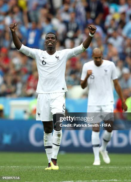 Paul Pogba of France celebrates following his sides victory in the 2018 FIFA World Cup Russia Quarter Final match between Uruguay and France at...