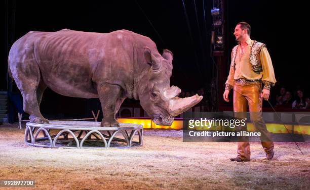 Animal trainer Martin Lacey presents the rhino show during the premiere of the Circus Krone at the Cannstatter Wasen in Stuttgart, Germany, 26...