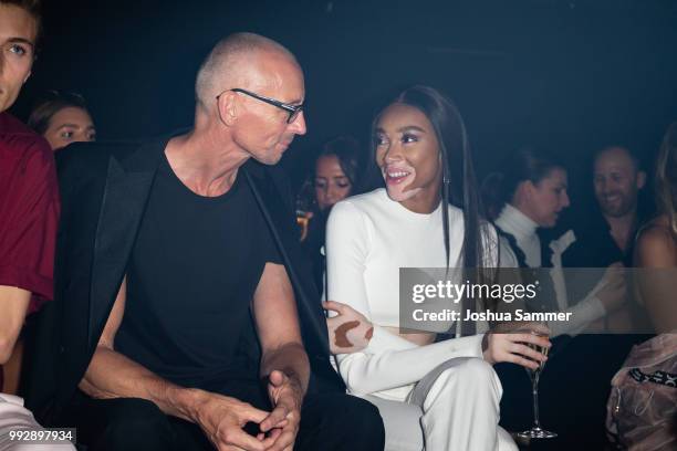 Ingo Wilts and Winnie Harlow attend the HUGO show during the Berlin Fashion Week Spring/Summer 2019 at Motorwerk on July 5, 2018 in Berlin, Germany.