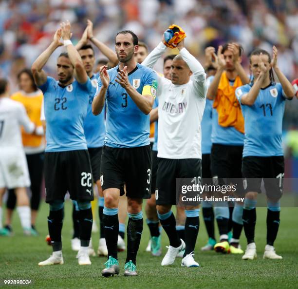 Uruguay players acknowledge the fans following the 2018 FIFA World Cup Russia Quarter Final match between Uruguay and France at Nizhny Novgorod...