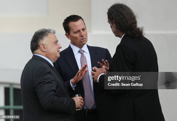 Ambassador Richard Grenell chats with Israeli Ambassador to Germany Jeremy Issacharoff and State Secretary Walter Lindner of the German Foreign...