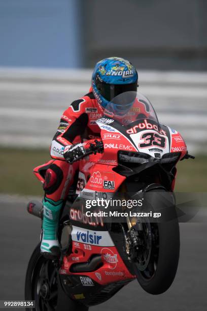 Marco Melandri of Italy and ARUBA.IT RACING-DUCATI lifts the front wheel during the WorldSBK Riviera di Rimini - Free Practice on July 6, 2018 in...