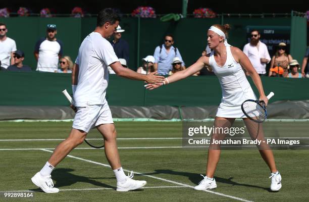 Ken Skupski and Anna Smith during the doubles on day five of the Wimbledon Championships at the All England Lawn Tennis and Croquet Club, Wimbledon.