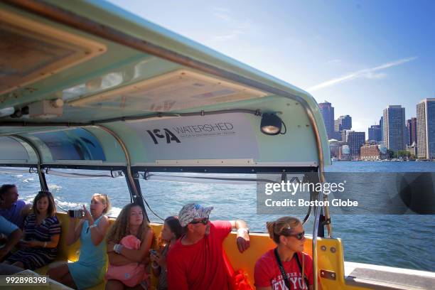 Patrons of the Institute of Contemporary Art, Boston take the water shuttle over to East Boston to visit the museum's new gallery space on July 4,...