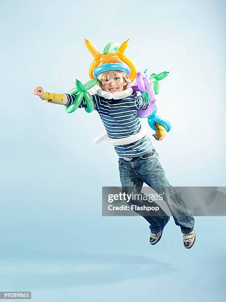 portrait of boy in fancy dress - child balloon studio photos et images de collection