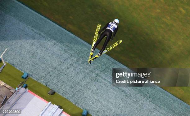 Polish ski jumper Kamil Stoch in action at the Erdinger Arena in Oberstdorf, Gemrany, 26 October 2017. Photo: Karl-Josef Hildenbrand/dpa