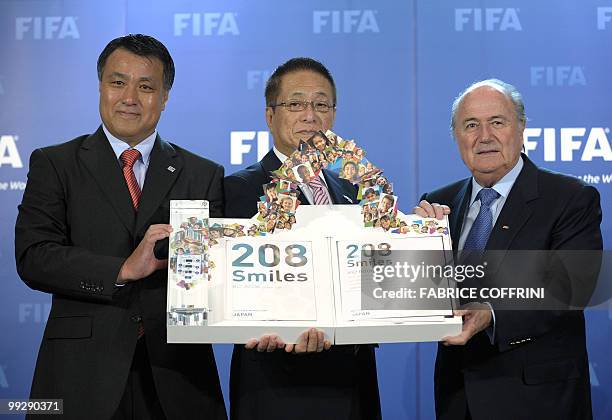 Japan Football Association secretary general Kohzo Tashima, President of The Japan Football Association and Chairman of the Japan bid Motoaki Inukai...