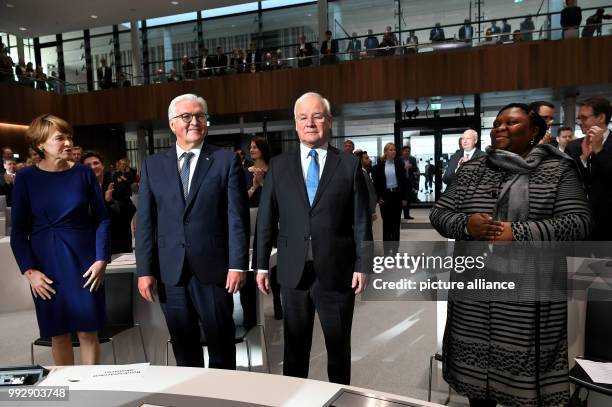 German President Frank-Walter Steinmeier , his wife Elke Buedenbender , the president of the state parliament of Lower Saxony, Bernd Busemann and...