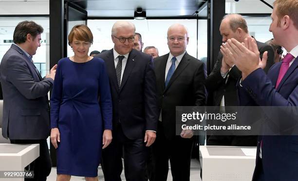 German President Frank-Walter Steinmeier , his wife Elke Buedenbender and the president of the state parliament of Lower Saxony, Bernd Busemann ,...