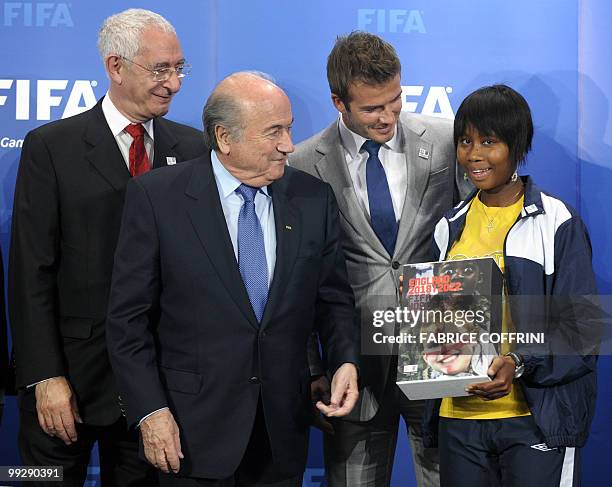 Bid chairman Lord Triesman, FIFA president Sepp Blatter, former England football captain David Beckham and Coaching for hope participant Nothemba...