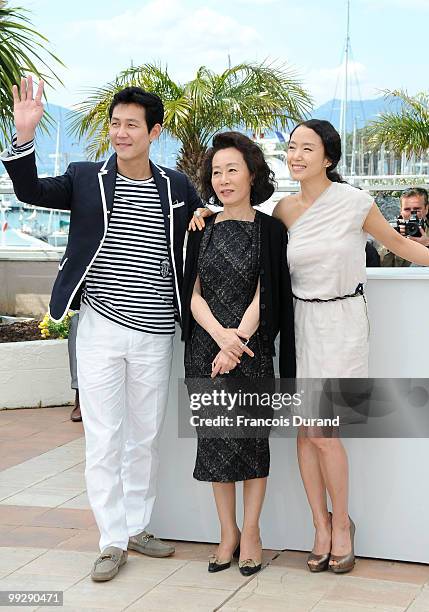 Actor Jung-Jae Lee with Yuh-Jung Youn and Do-Youn Jeon attend the 'The Housemaid' Photocall at the Palais des Festivals during the 63rd Annual Cannes...