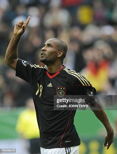 Germany's striker Cacau celebrates after scoring during the friendly football match Germany vs Malta in the western German city of Aachen on May 13,...