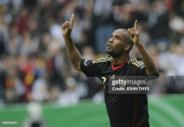 Germany's striker Cacau celebrates after scoring during the friendly football match Germany vs Malta in the western German city of Aachen on May 13,...