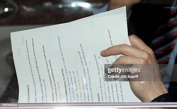 Detailed view of a document being read by British Prime Minister David Cameron which lists the names of his Ministers on May 14, 2010 in London,...