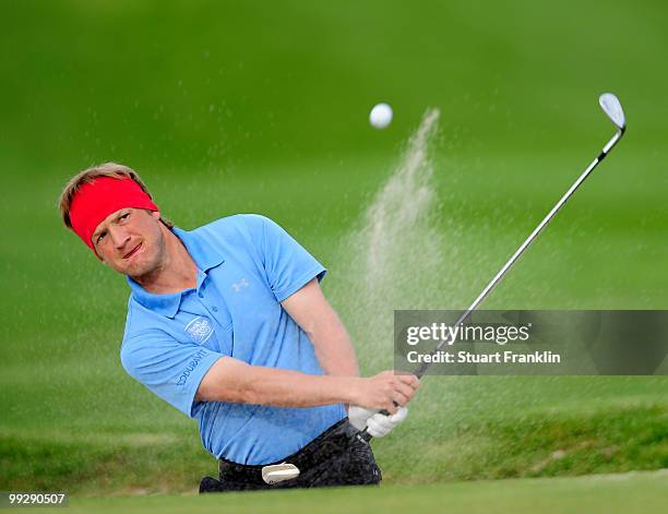 Pelle Edberg of Sweden plays his bunker shot on the 12th hole during the second round of the Open Cala Millor Mallorca at Pula golf club on May 14,...