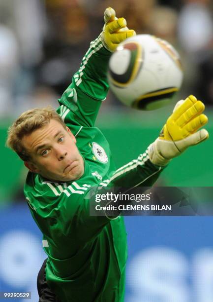 Germany's goalkeeper Manuel Neuer makes a save during the friendly football match Germany vs Malta in the western German city of Aachen on May 13,...