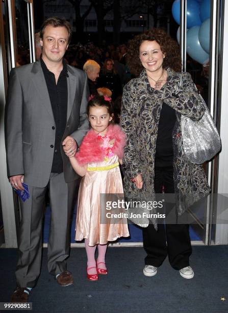 Nadia Sawalha, husband Mark Adderley and their daughter Maddie attend the world premiere of 'Nanny McPhee And The Big Bang' at Odeon West End on...