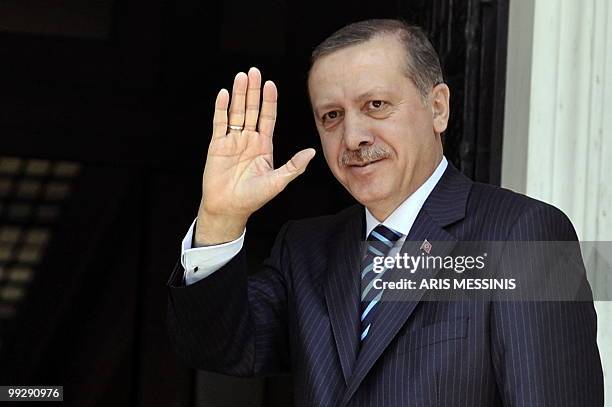 Turkish Prime Ministert Recep Tayyip Erdogan waves before his meeting with Greek Premier George Papandreou in Athens on May 14, 2010. Turkey's Prime...