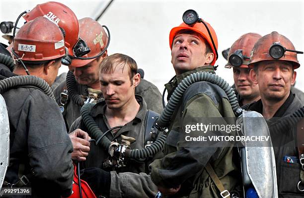 Russian rescuers take part in the rescue operation at Raspadskaya mine in the town of Mezhdurechensk, Kemerovo region of Western Siberia on May 12,...