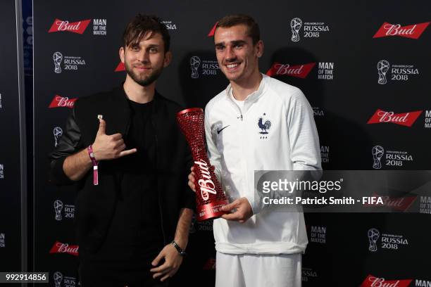 Antoine Griezmann of France poses with his Man of the Match Trophy following his performance in the 2018 FIFA World Cup Russia Quarter Final match...