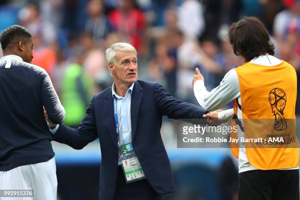 Didier Deschamps head coach / manager of France speaks with Edison Cavani of Uruguay at the end of the 2018 FIFA World Cup Russia Quarter Final match...