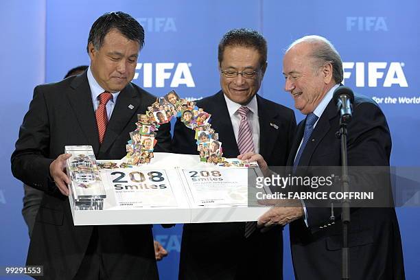 Japan Football Association secretary general Kohzo Tashima, President of The Japan Football Association and Chairman of the Japan bid Motoaki Inukai...