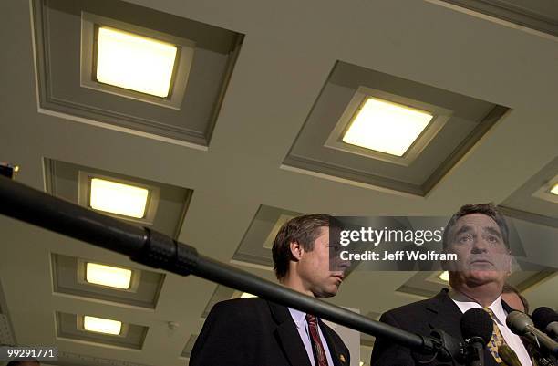 Congressman W.J. Tauzin, R-3-LA, addresses the press with Fred Upton, R-6-MI, after a meeting with Ford's CEO Jacques Nasser.