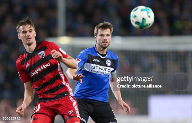 Bielefeld's Julian Boerner and Stefan Kutschke of Ingolstadt during the German 2nd Bundesliga football match between Arminia Bielefeld and FC...