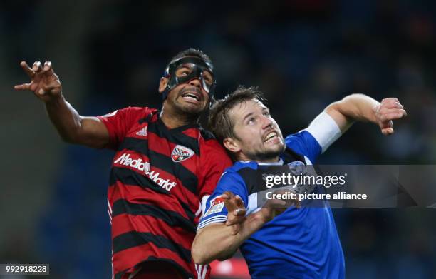 Bielefeld's Julian Boerner and Marvin Matip of Ingolstadt vie for the ball during the German 2nd Bundesliga football match between Arminia Bielefeld...