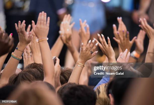 View of fans waving at ABC's "Good Morning America" at Rumsey Playfield, Central Park on July 6, 2018 in New York City.