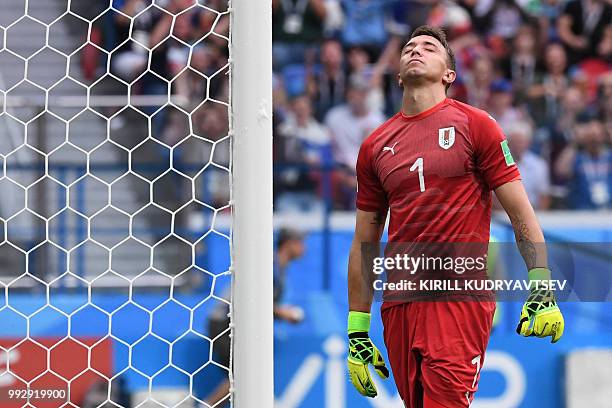 Uruguay's goalkeeper Fernando Muslera reacts after missing to save France's second goal during the Russia 2018 World Cup quarter-final football match...