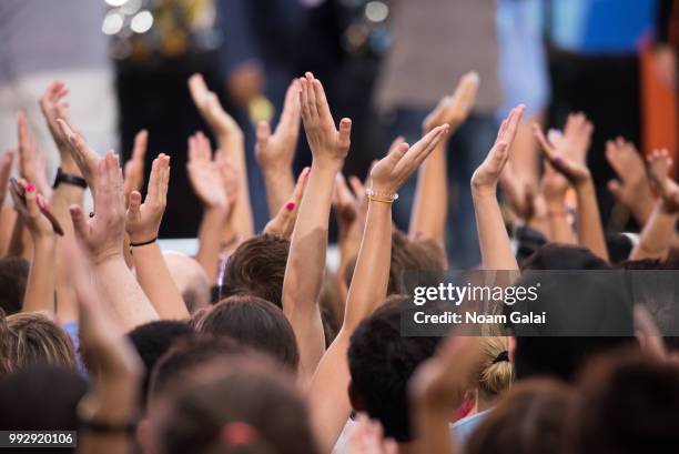 View of fans clapping at ABC's "Good Morning America" at Rumsey Playfield, Central Park on July 6, 2018 in New York City.