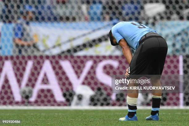 Uruguay's forward Luis Suarez reacts to France's victory at the end of the the Russia 2018 World Cup quarter-final football match between Uruguay and...