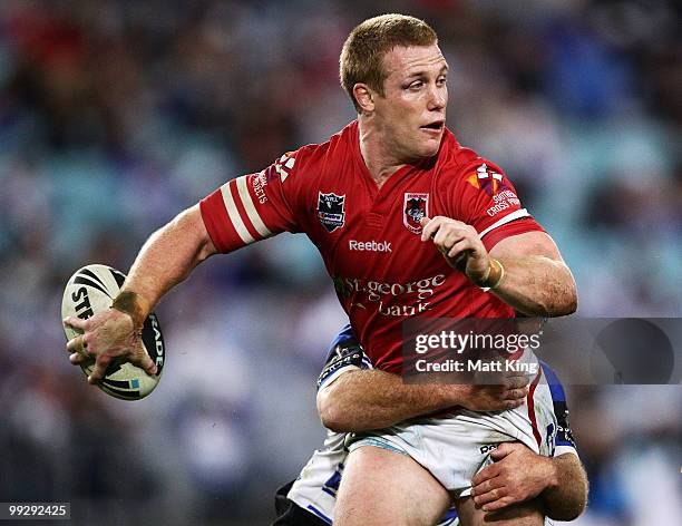 Ben Creagh of the Dragons looks for support in a tackle during the round 10 NRL match between the Canterbury-Bankstown Bulldogs and the St George...
