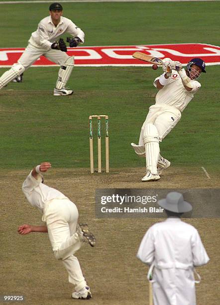 Alec Stewart of England is struck by a ball from Brett Lee of Australia, during day three of the fourth test between England and Australia at...