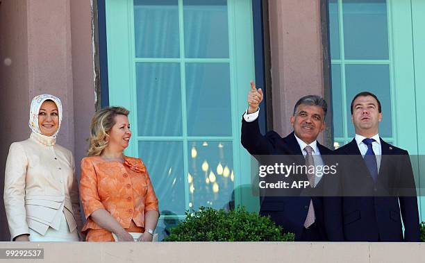 Russian President Dmitry Medvedev and his wife Svetlana are welcomed by Turkish President Abdullah Gul and his wife Hayrunissa before their meeting...