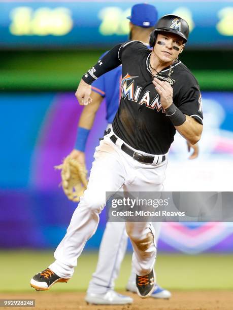 Derek Dietrich of the Miami Marlins runs the bases against the New York Mets at Marlins Park on June 29, 2018 in Miami, Florida.
