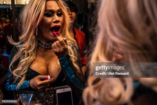 Indonesian drag queen Nury apply make-up before performing in Mixwell bar on July 4, 2018 in Seminyak, Bali, Indonesia. Mixwell bar has been...