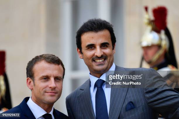 The President of the French Republic, Emmanuel Macron receives Sheikh Tamim bin Hamad Al Thani, Emir of the State of Qatar at the Elysée Palace, in...