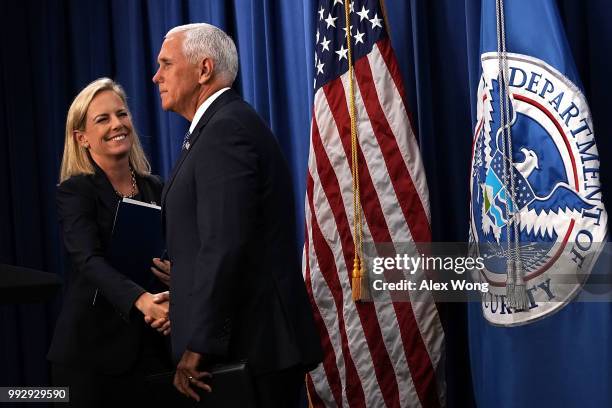Vice President Mike Pence greets Homeland Security Secretary Kirstjen Nielsen during a visit to the U.S. Immigration and Customs Enforcement agency...
