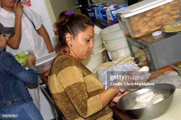 Josephina Mejia prepares an order in the kitchen of Bistro Italiano on 320 D St. NE.