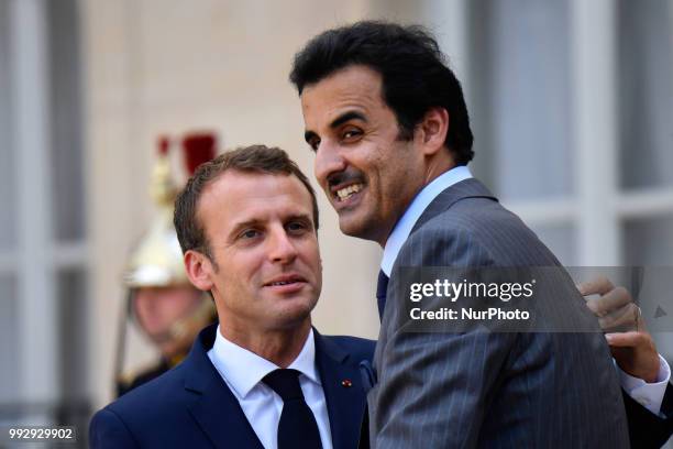 The President of the French Republic, Emmanuel Macron receives Sheikh Tamim bin Hamad Al Thani, Emir of the State of Qatar at the Elysée Palace, in...