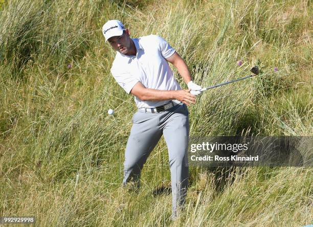 Bradley Neil of Scotland plays his third shot on the 13th hole during the second round of the Dubai Duty Free Irish Open at Ballyliffin Golf Club on...
