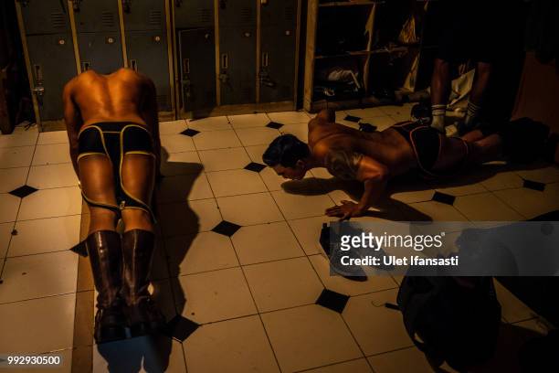 Dancers prepare before performing Go-Go dance in Mixwell bar on July 4, 2018 in Seminyak, Bali, Indonesia. For the past 12 years Mixwell bar has been...