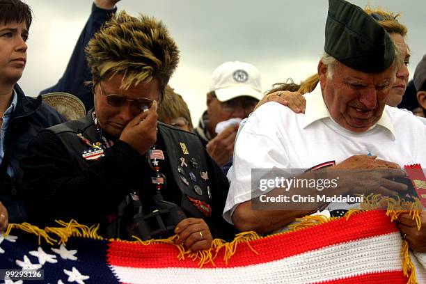 Teresa Mastillo-Flick, from Somerset County, Pa., and Charles Vizzini, from Evansburg, Pa., at a memorial service for Flight 93 in Shanksville, Pa....