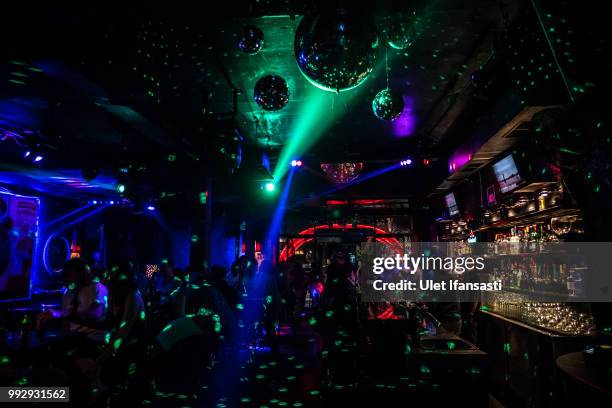 Crowds in Mixwell bar on July 4, 2018 in Seminyak, Bali, Indonesia. For the past 12 years Mixwell bar has been described as "Bali's Best Gay Bar",...